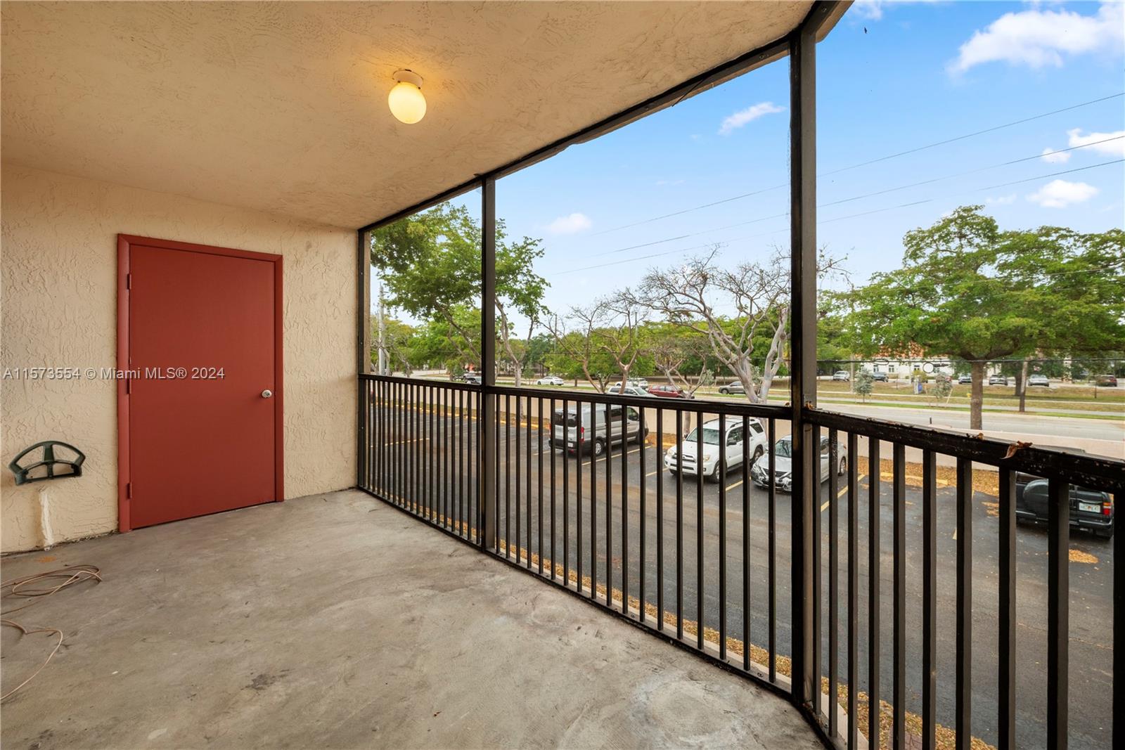 3252 Foxcroft Road, Unit 216 Miramar, FL 33025 - Photo 9 of 16 a view of a porch