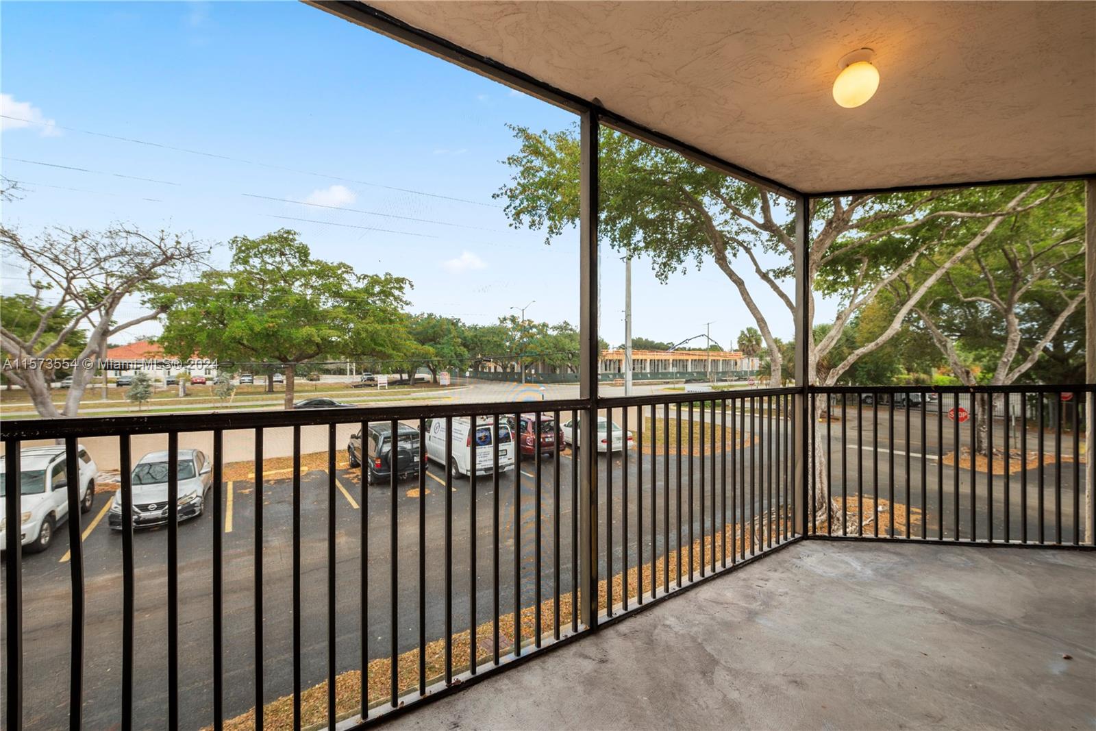 3252 Foxcroft Road, Unit 216 Miramar, FL 33025 - Photo 10 of 16 a balcony with outdoor space