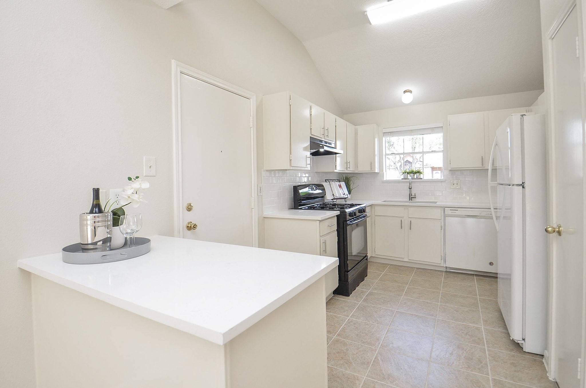 22819 Pebworth Place Spring, TX 77373 - Photo 6 of 22 Updated kitchen with new quartz counters and backsplash, fresh paint.