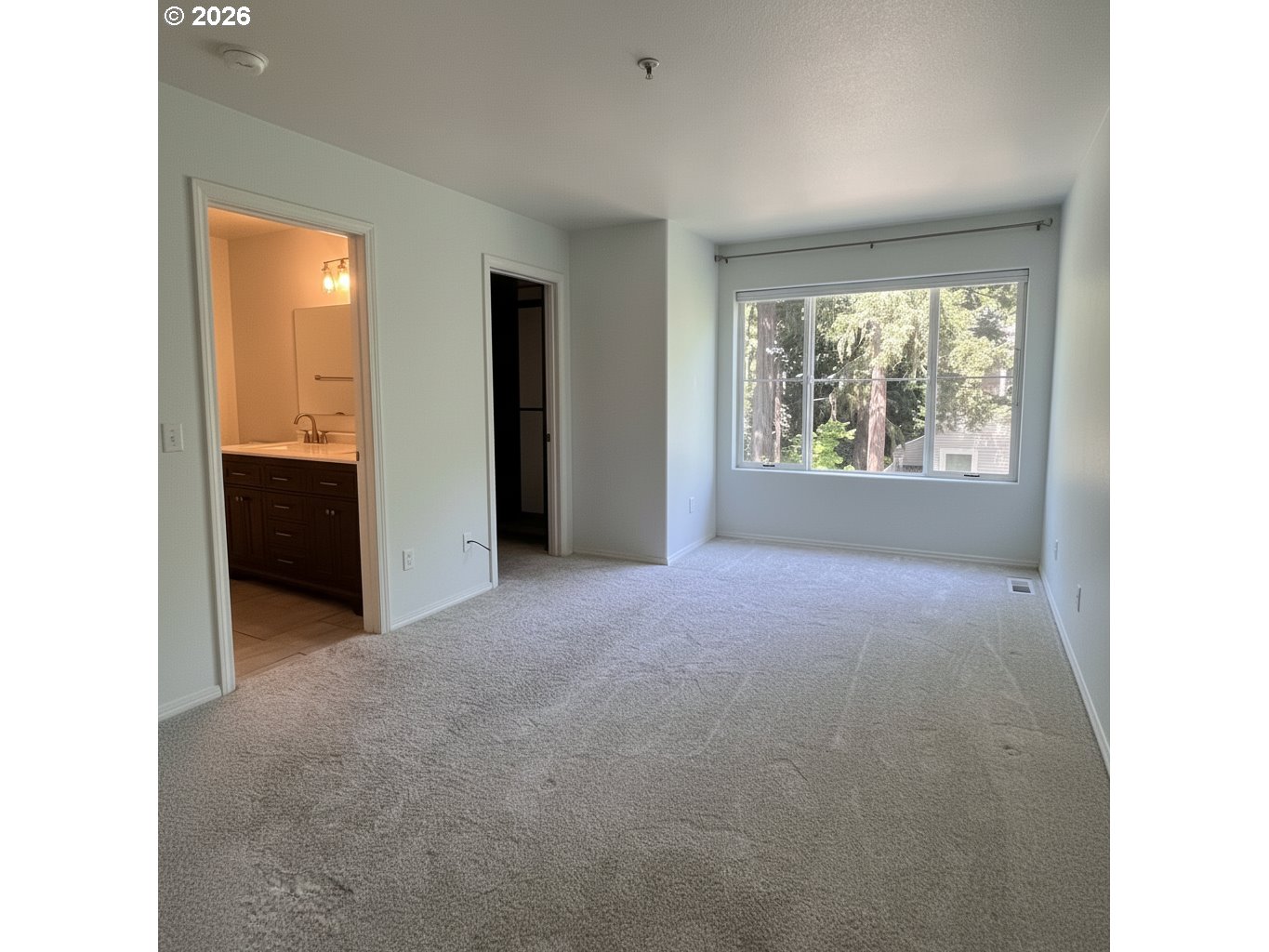 14110 Southwest Barrows Road, Unit 1 Portland, OR 97223 - Photo 11 of 18 a view of an empty room with a window