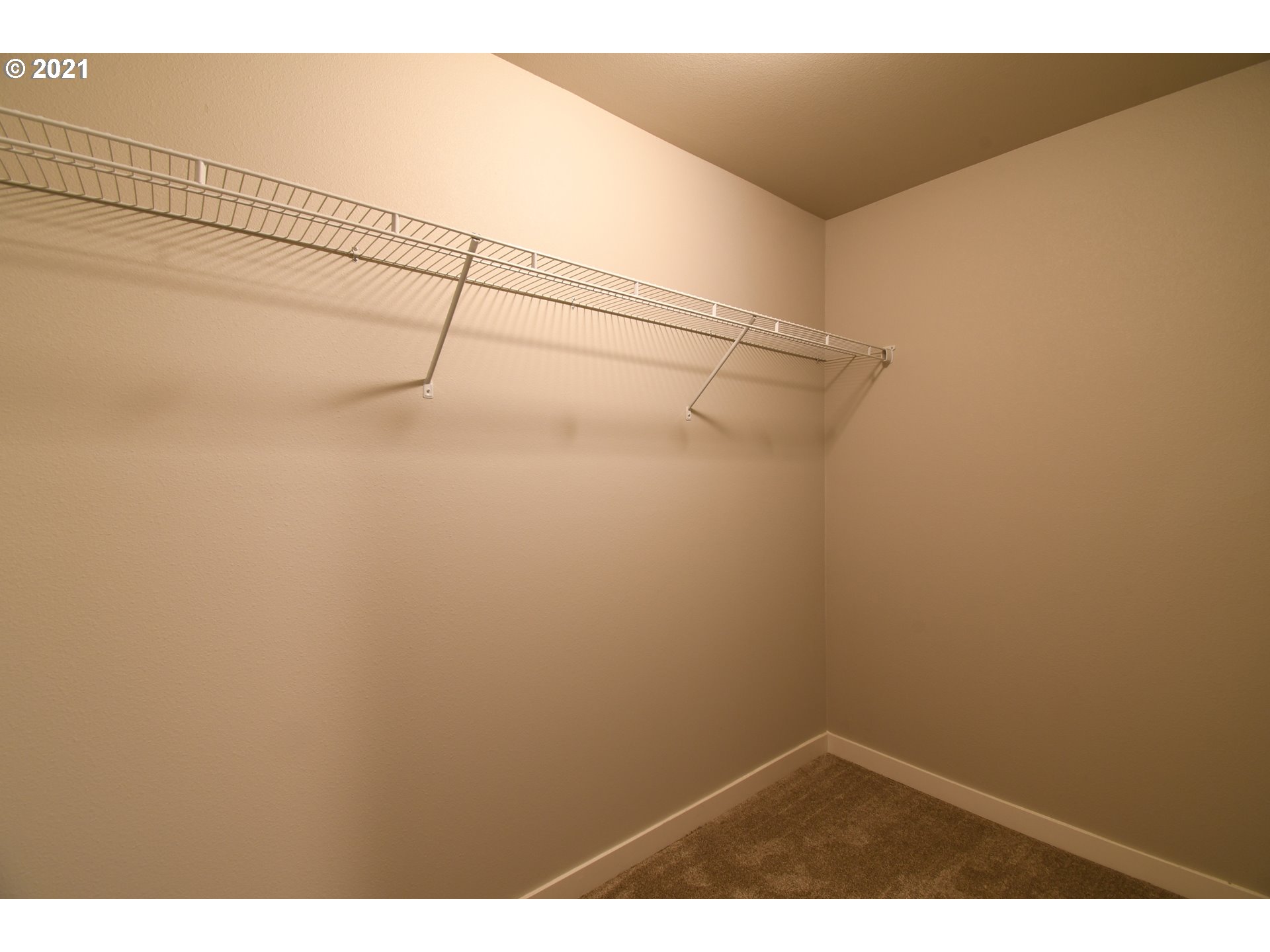 116 North 44th Place Ridgefield, WA 98642 - Photo 14 of 20 a view of a room with racks on the wall
