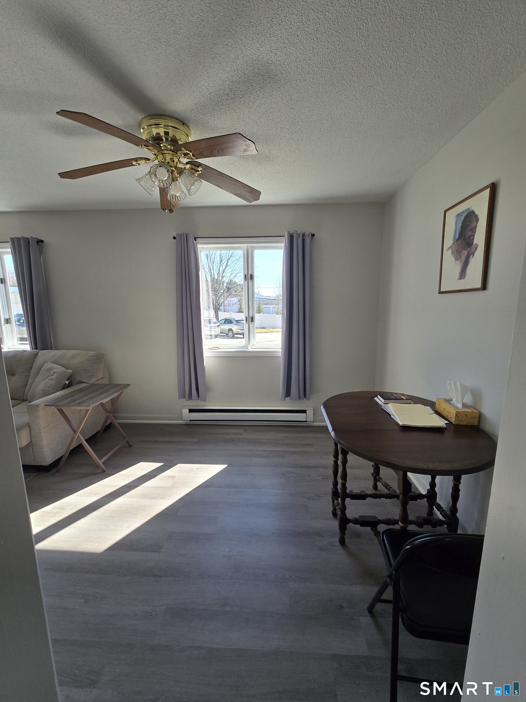 177 Lisle Street, Unit 5 Torrington, CT 06790 - Photo 12 of 18 a workspace with furniture window and wooden floor