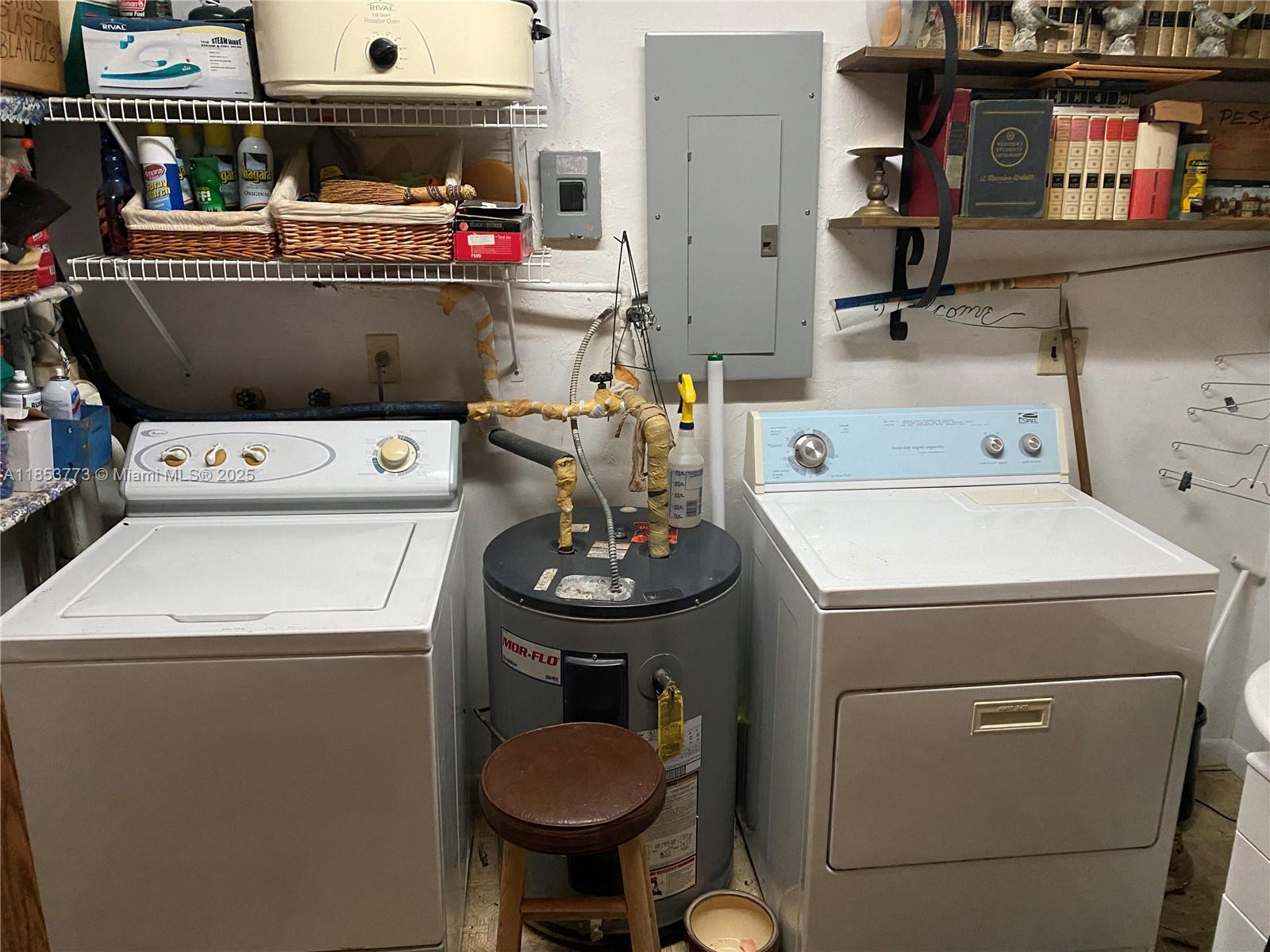 8120 Southwest 10th Terrace Miami, FL 33144 - Photo 9 of 12 a utility room with dryer and washer