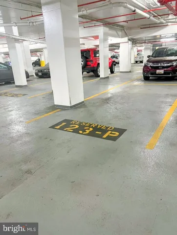 a bathroom with a glass door shower