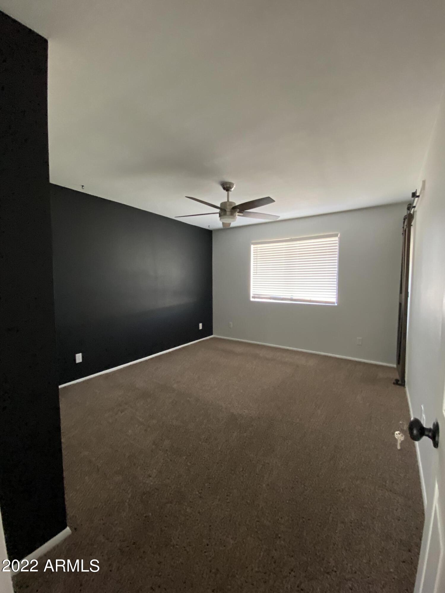 3244 West Yucca Street Phoenix, AZ 85029 - Photo 19 of 21 a view of empty room with window