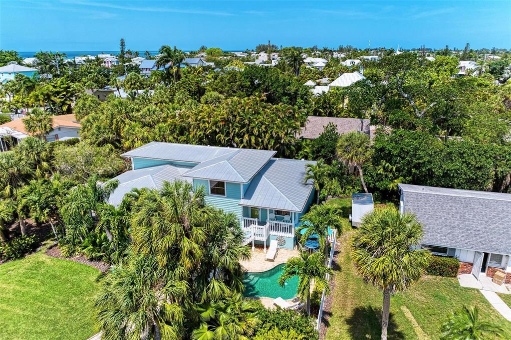 304 74th Street, Unit B Holmes Beach, FL 34217 - Photo 31 of 34 an aerial view of multiple house