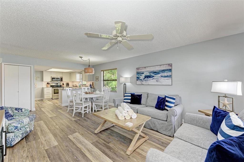 304 74th Street, Unit B Holmes Beach, FL 34217 - Photo 6 of 34 a living room with furniture