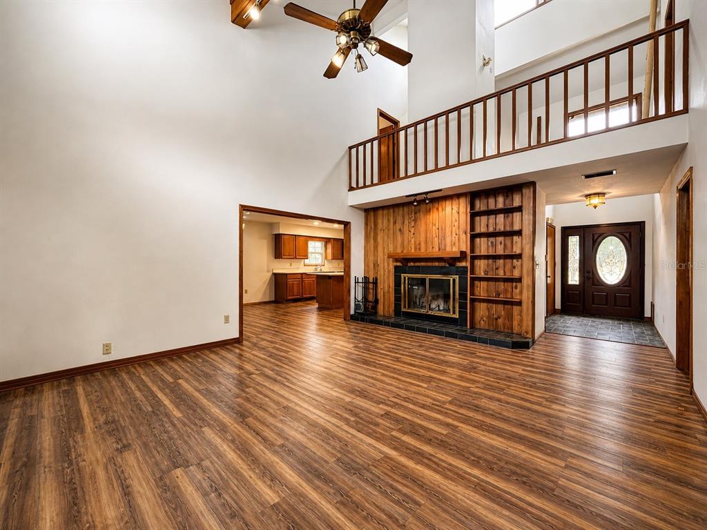 7119 Immokalee Road Keystone Heights, FL 32656 - Photo 10 of 50 a view of an entryway with wooden floor