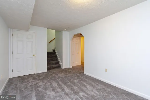 a view of a deck with a large window