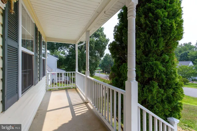 a view of balcony with furniture