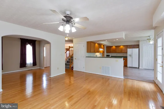 a view of a kitchen and a window