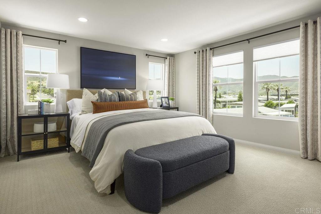 8600 Amherst Street Santee, CA 92071 - Photo 3 of 5 a bedroom with a bed and a large window