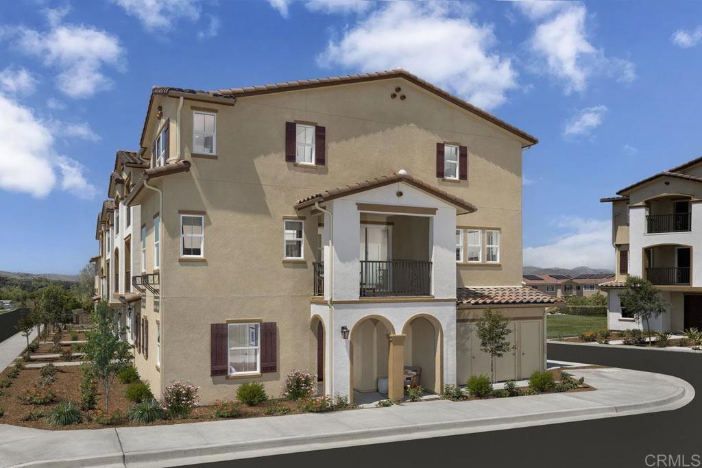 8600 Amherst Street Santee, CA 92071 - Photo 4 of 5 a front view of a house with garden