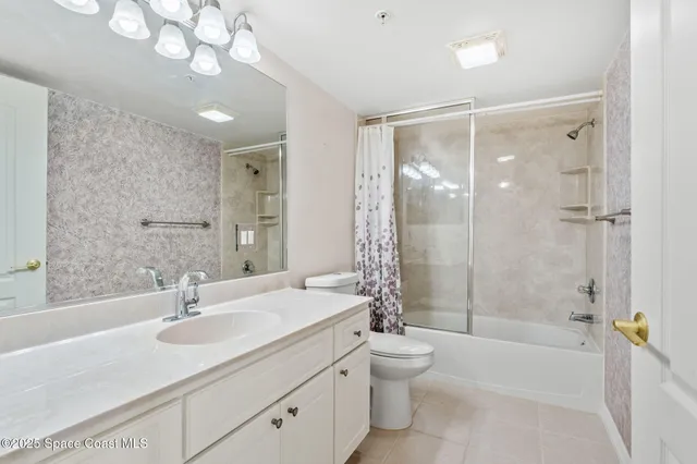 a view of a balcony with a pot