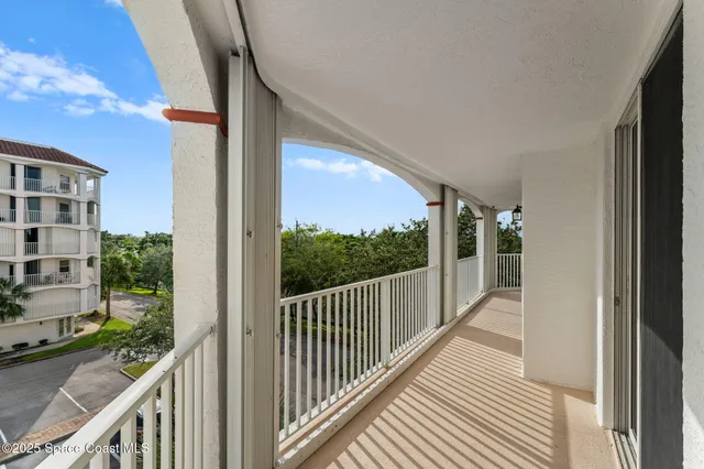 a view of a balcony with outdoor space