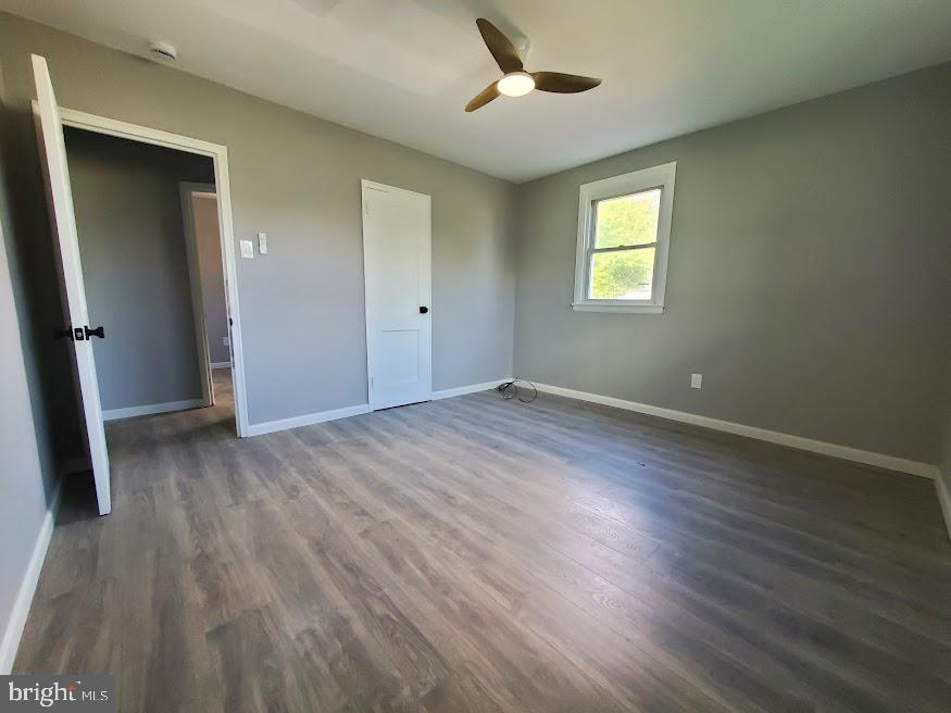 110 Lemmon Avenue Pemberton, NJ 08068 - Photo 7 of 15 a view of an empty room with wooden floor and a window