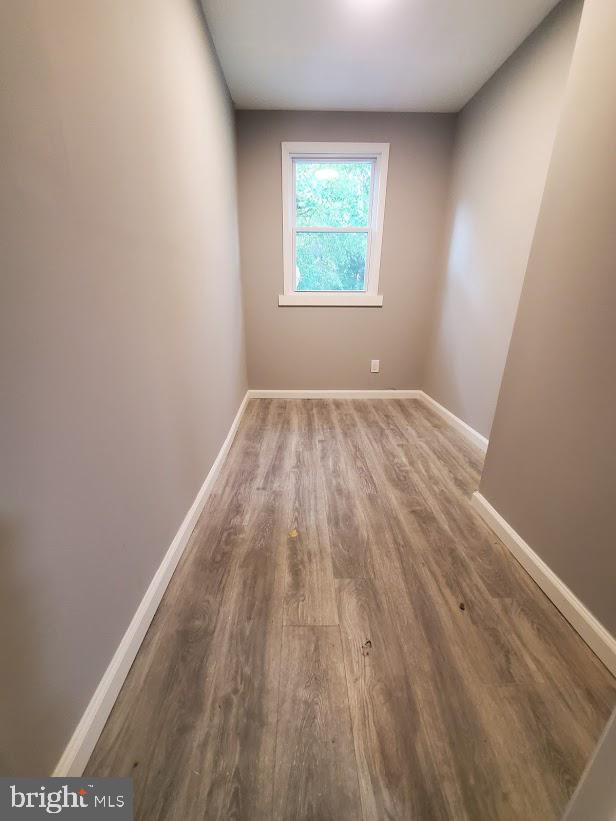 110 Lemmon Avenue Pemberton, NJ 08068 - Photo 10 of 15 an empty room with wooden floor and windows