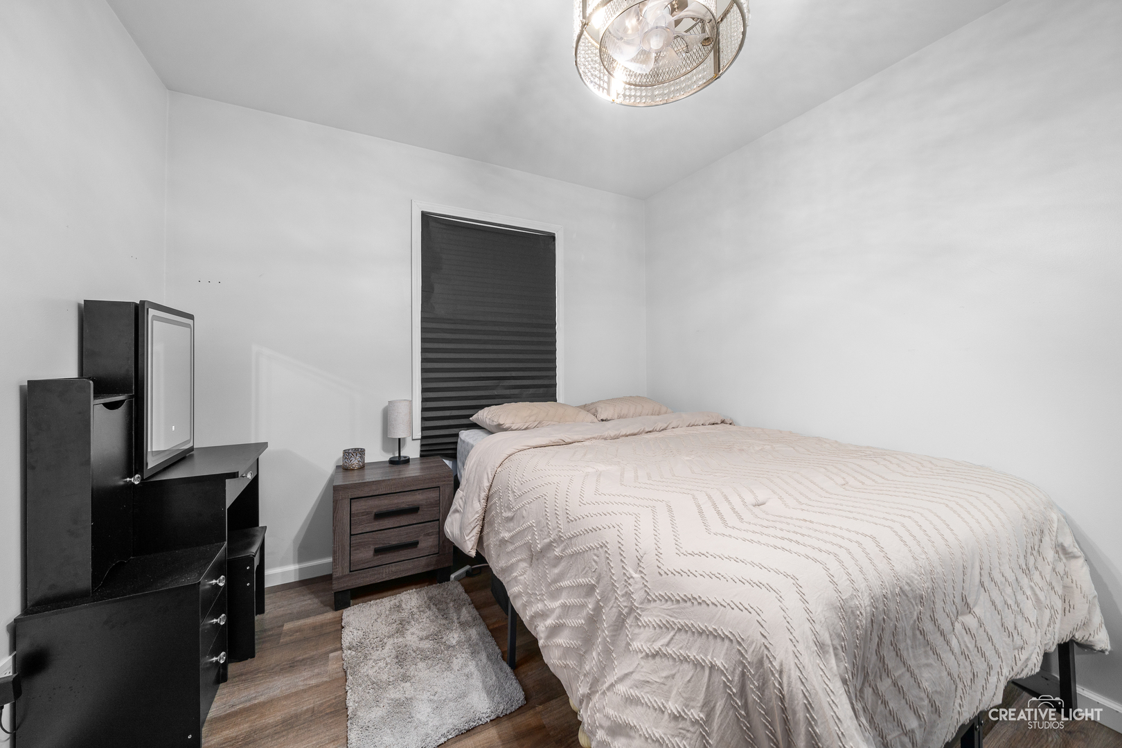 3000 Art Schultz Drive Plainfield, IL 60586 - Photo 14 of 18 a bedroom with a bed and a television