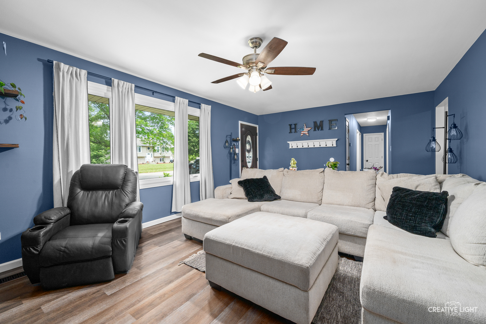 3000 Art Schultz Drive Plainfield, IL 60586 - Photo 5 of 18 a living room with furniture and a large window