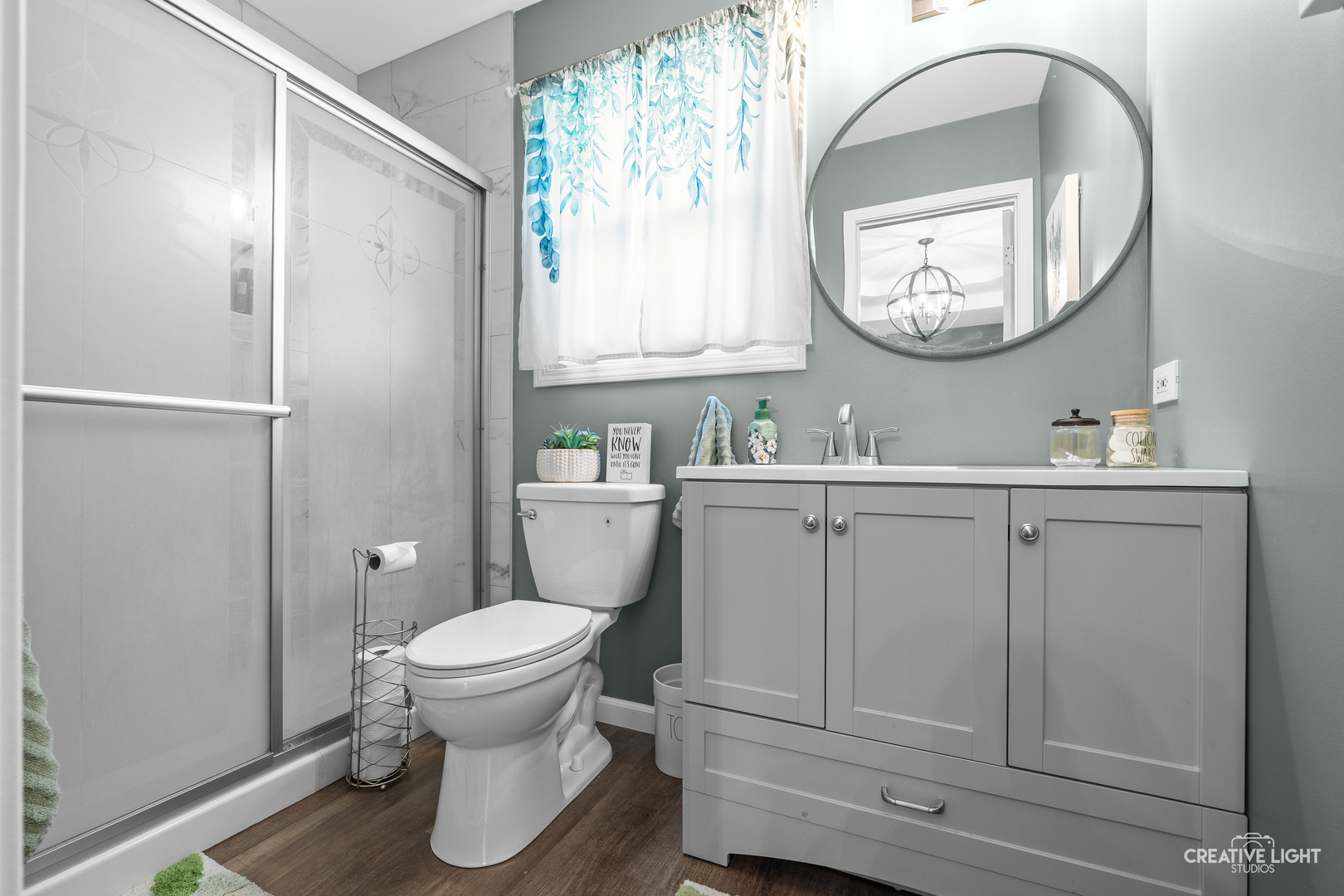 3000 Art Schultz Drive Plainfield, IL 60586 - Photo 10 of 18 a bathroom with a toilet a sink and a mirror