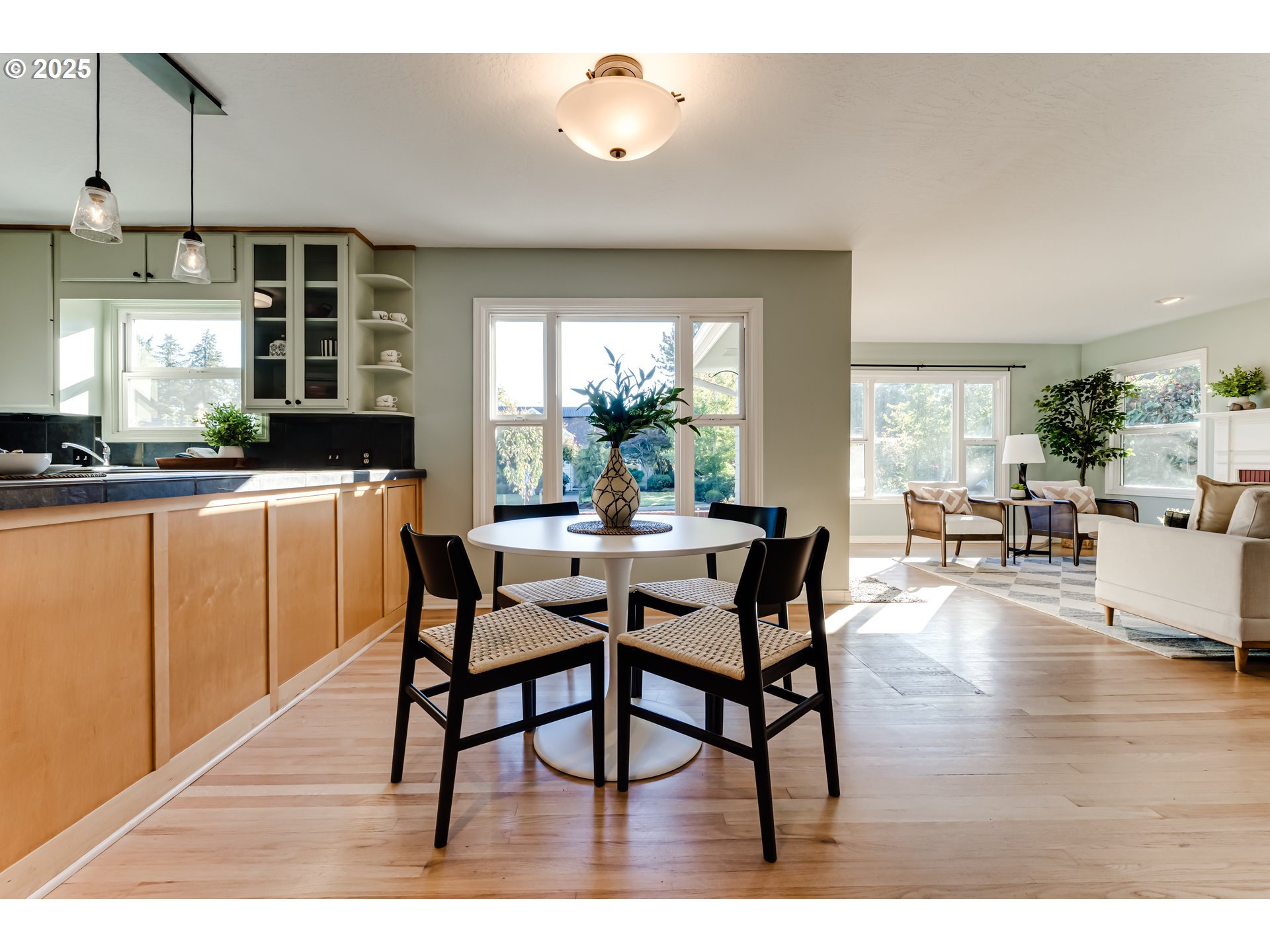 2140 Monroe Street Eugene, OR 97405 - Photo 12 of 35 a dining room with furniture window and wooden floor