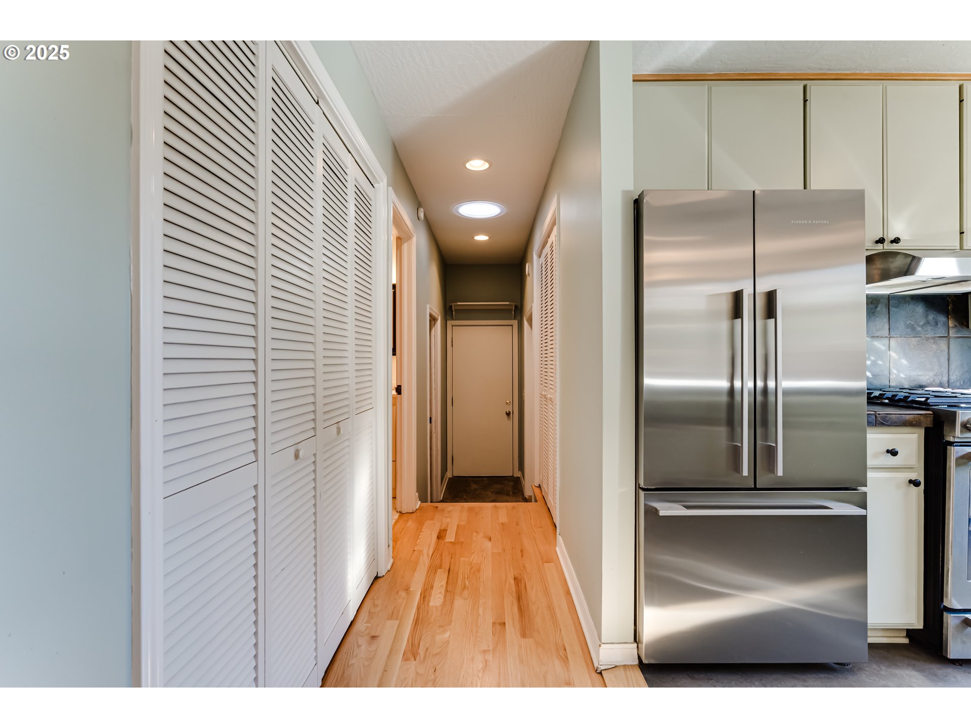 2140 Monroe Street Eugene, OR 97405 - Photo 17 of 35 a view of a kitchen from the hallway