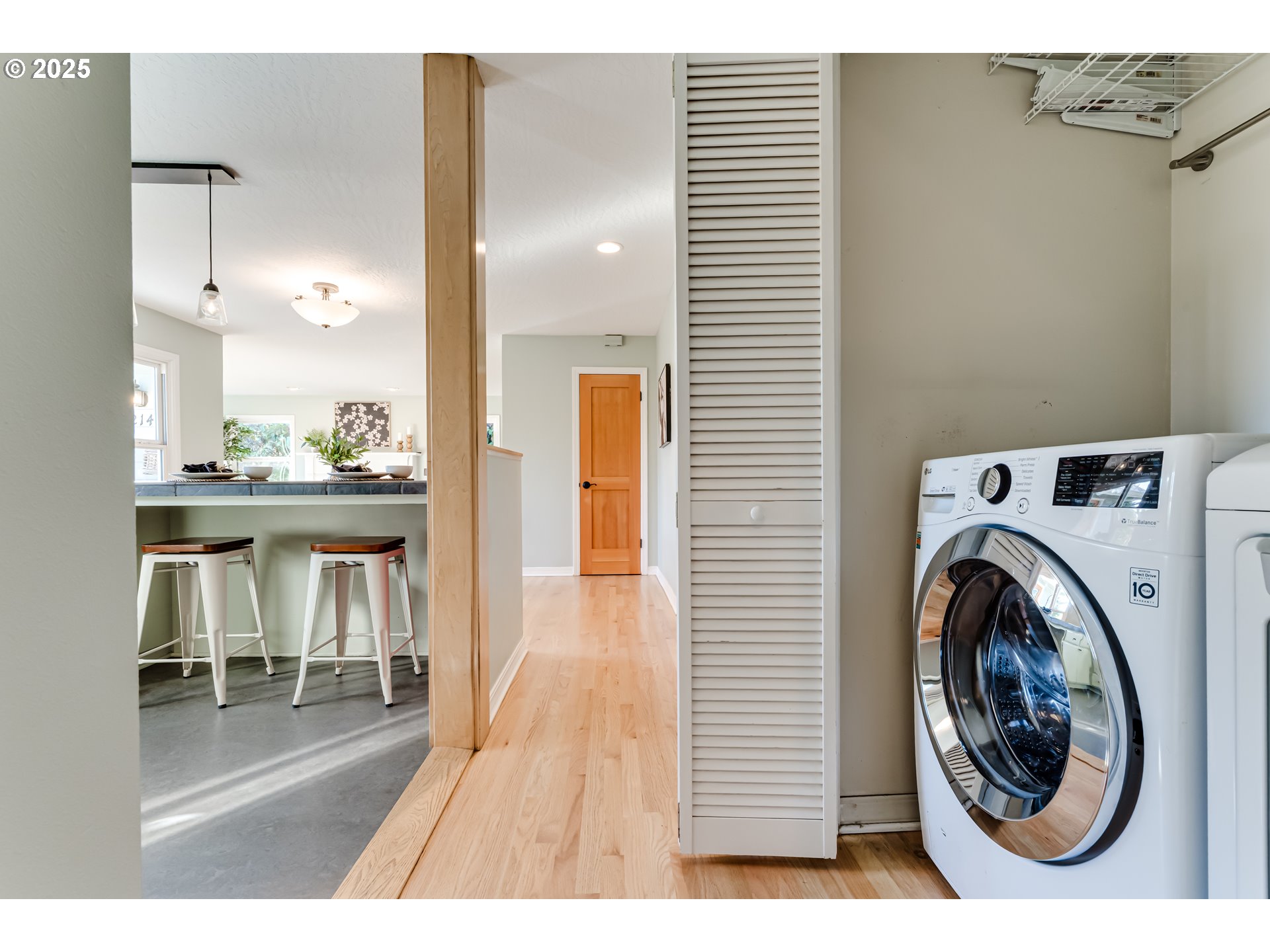 2140 Monroe Street Eugene, OR 97405 - Photo 23 of 35 a view of a hallway with washer and dryer