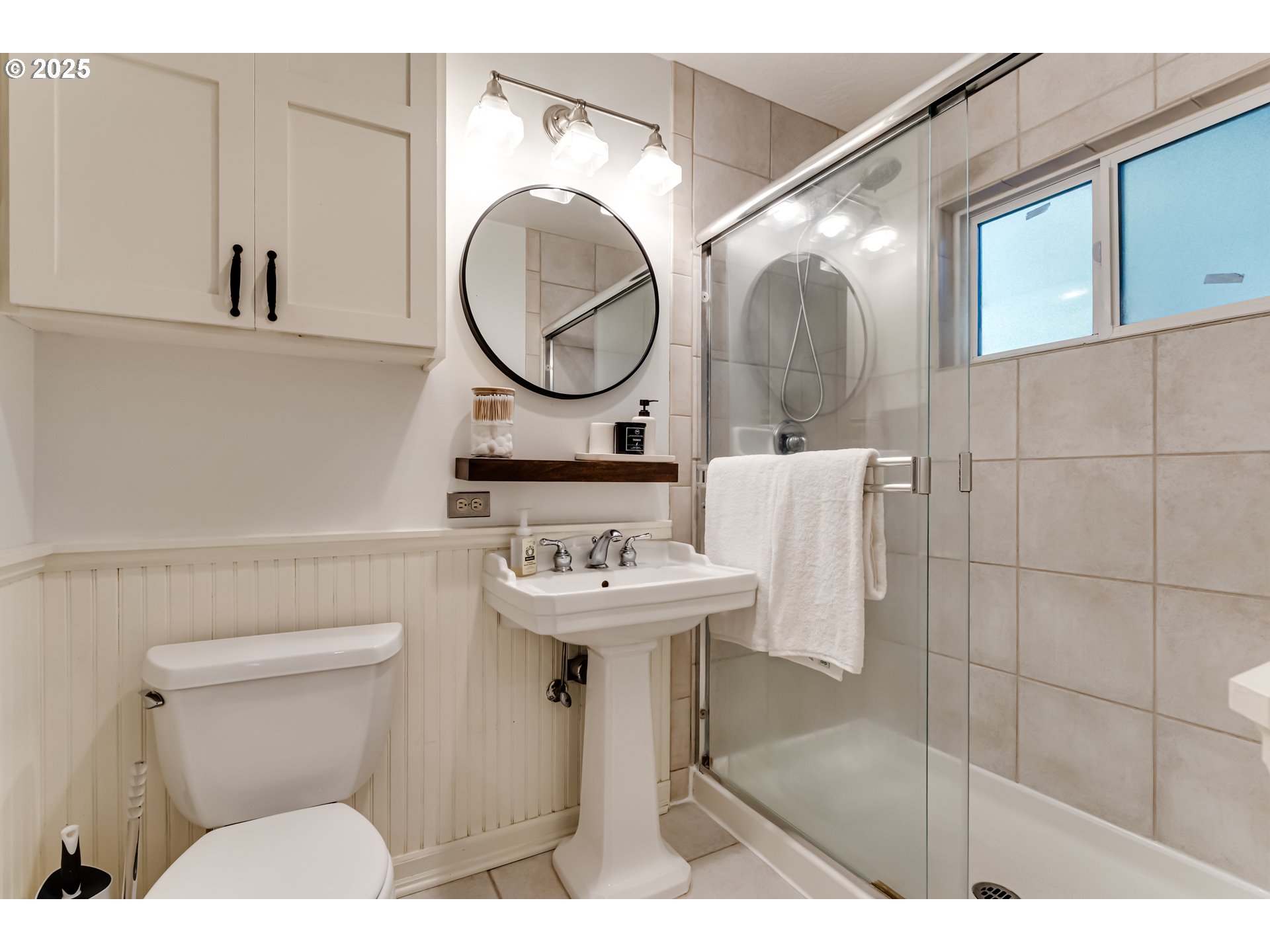 2140 Monroe Street Eugene, OR 97405 - Photo 26 of 35 a bathroom with a sink a mirror and a toilet
