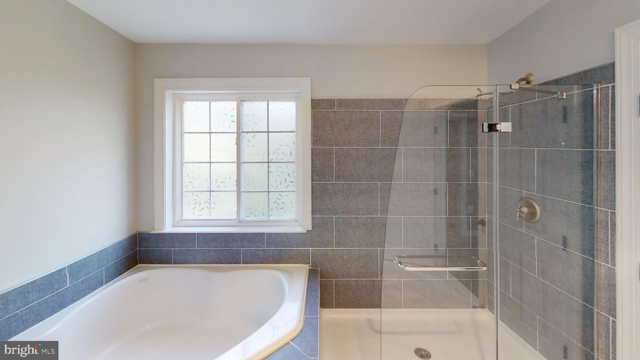 13554 Davinci Lane Herndon, VA 20171 - Photo 7 of 15 Updated Primary Bath with Frameless Shower