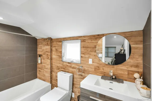 a bathroom with a shower and a sink