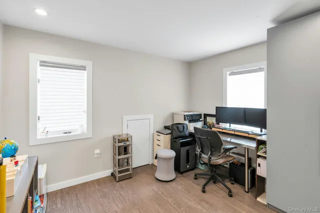 a room with furniture and a wooden floor