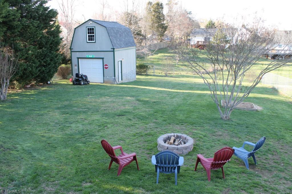 211 Albertson Road Thomasville, NC 27360 - Photo 14 of 18 Huge backyard with 1-car storage barn.