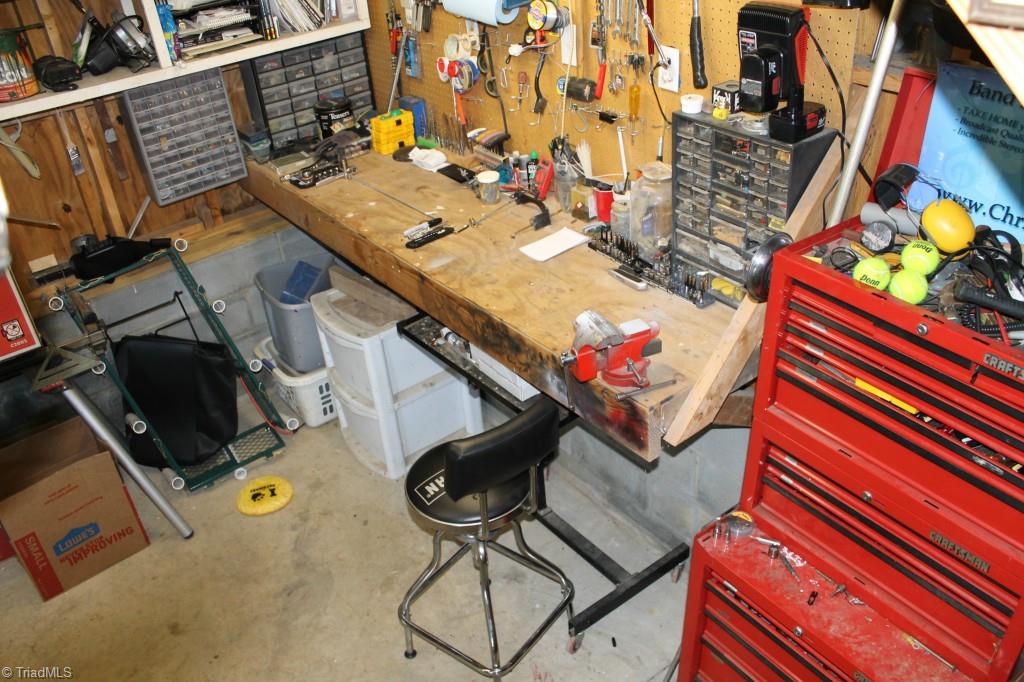 211 Albertson Road Thomasville, NC 27360 - Photo 15 of 18 Lit workbench in the barn.