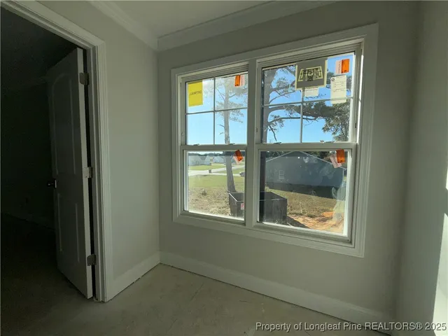 a bathroom with a granite countertop toilet and a shower