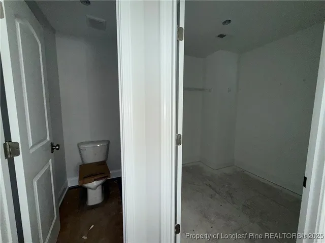 a bathroom with sink granite and mirror
