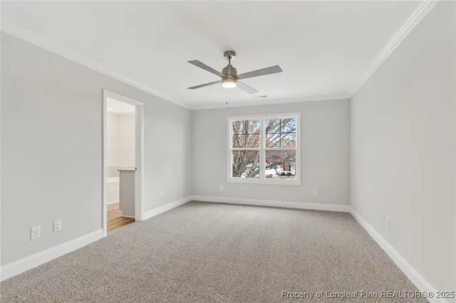 a bathroom with a granite countertop sink a mirror and shower