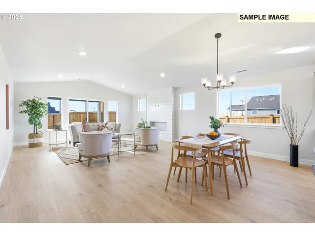 a open kitchen with a table and chairs