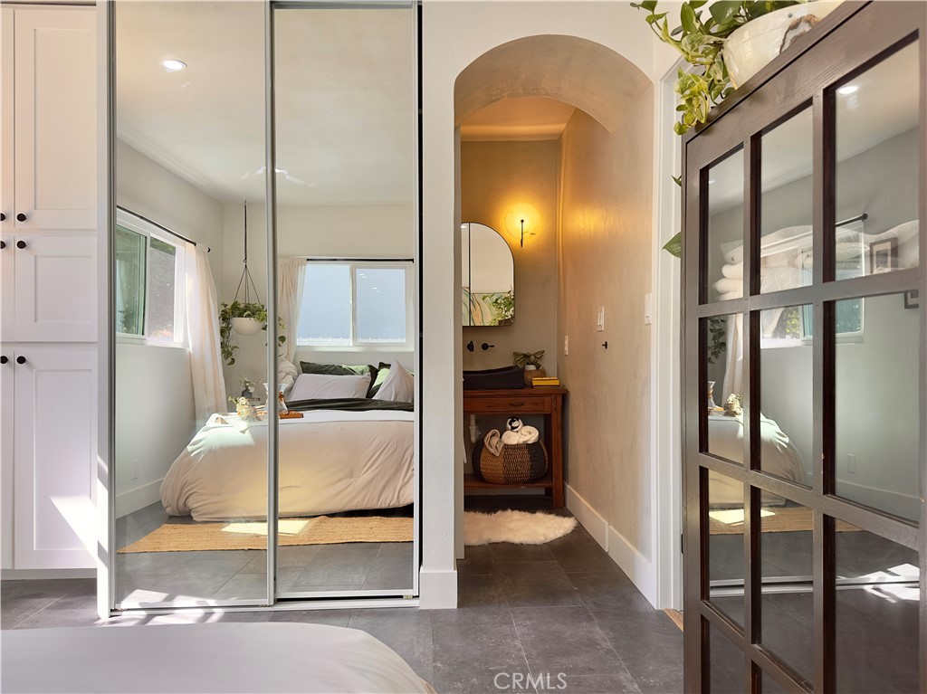 2907 South Ridgeley Drive Los Angeles, CA 90016 - Photo 22 of 37 a en suite bathroom with a tub and shower