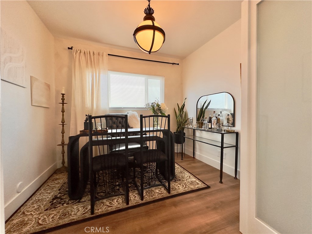 2907 South Ridgeley Drive Los Angeles, CA 90016 - Photo 30 of 37 a view of a livingroom with furniture and window