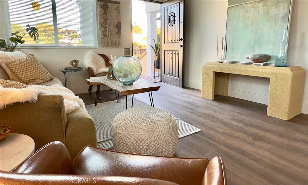 2907 South Ridgeley Drive Los Angeles, CA 90016 - Photo 7 of 37 a living room with furniture and wooden floor