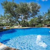 a view of a swimming pool with lounge chair