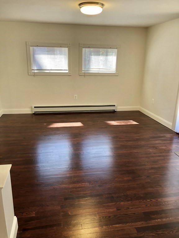 101 Parker Road Lancaster, MA 01523 - Photo 18 of 35 a view of room with wooden floor