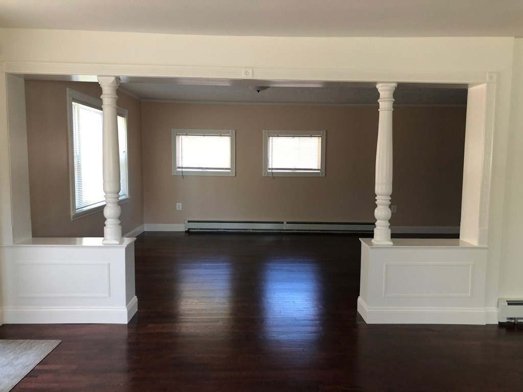 101 Parker Road Lancaster, MA 01523 - Photo 19 of 35 a view of room with window and wooden floor