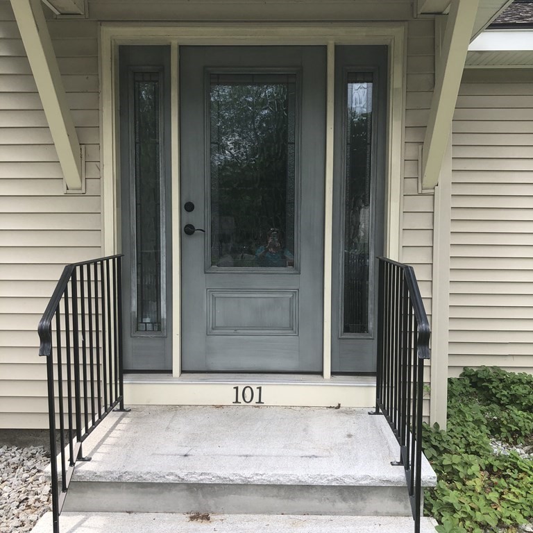 101 Parker Road Lancaster, MA 01523 - Photo 3 of 35 a view of entrance door of the house