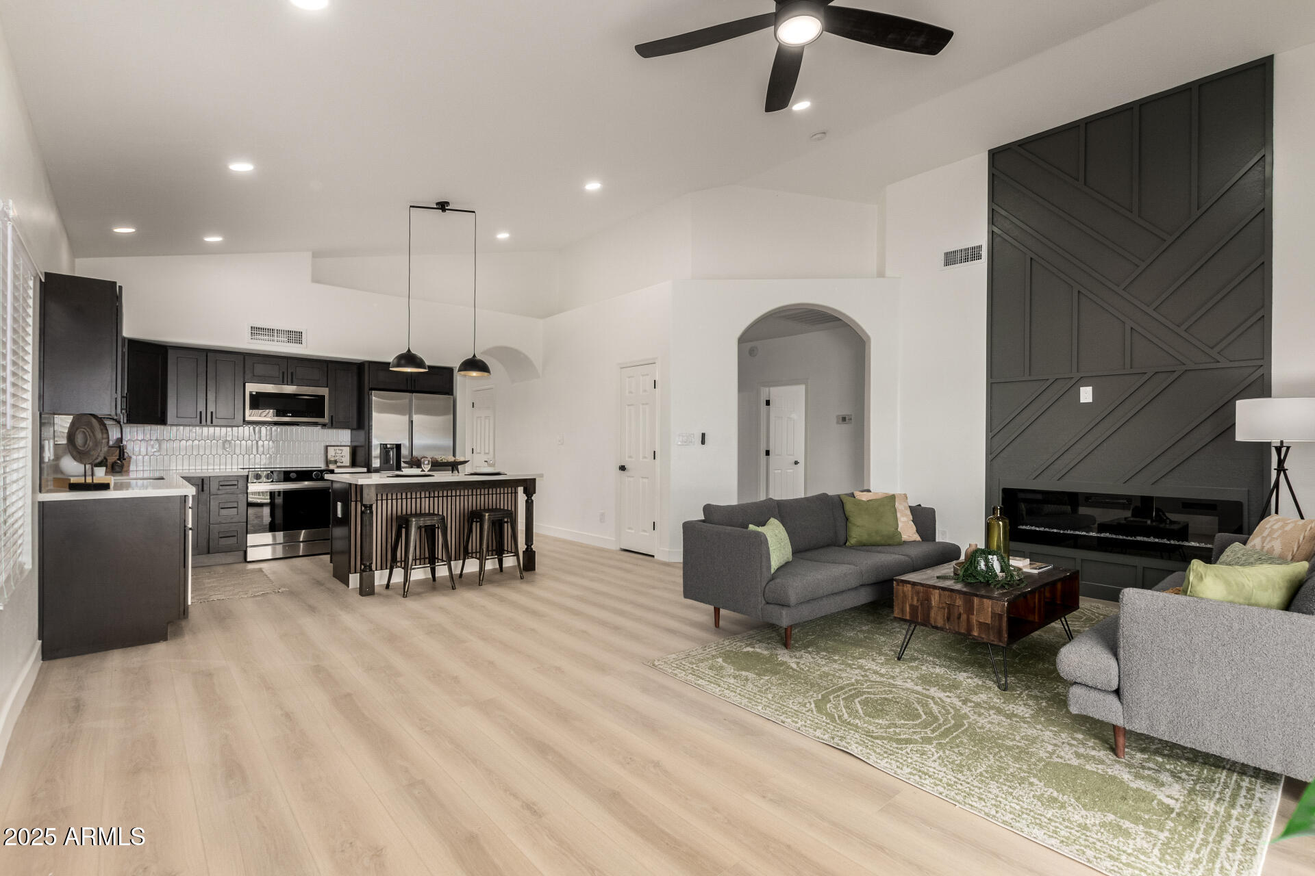 786 South Catalina Street Gilbert, AZ 85233 - Photo 1 of 34 a living room with furniture and kitchen view