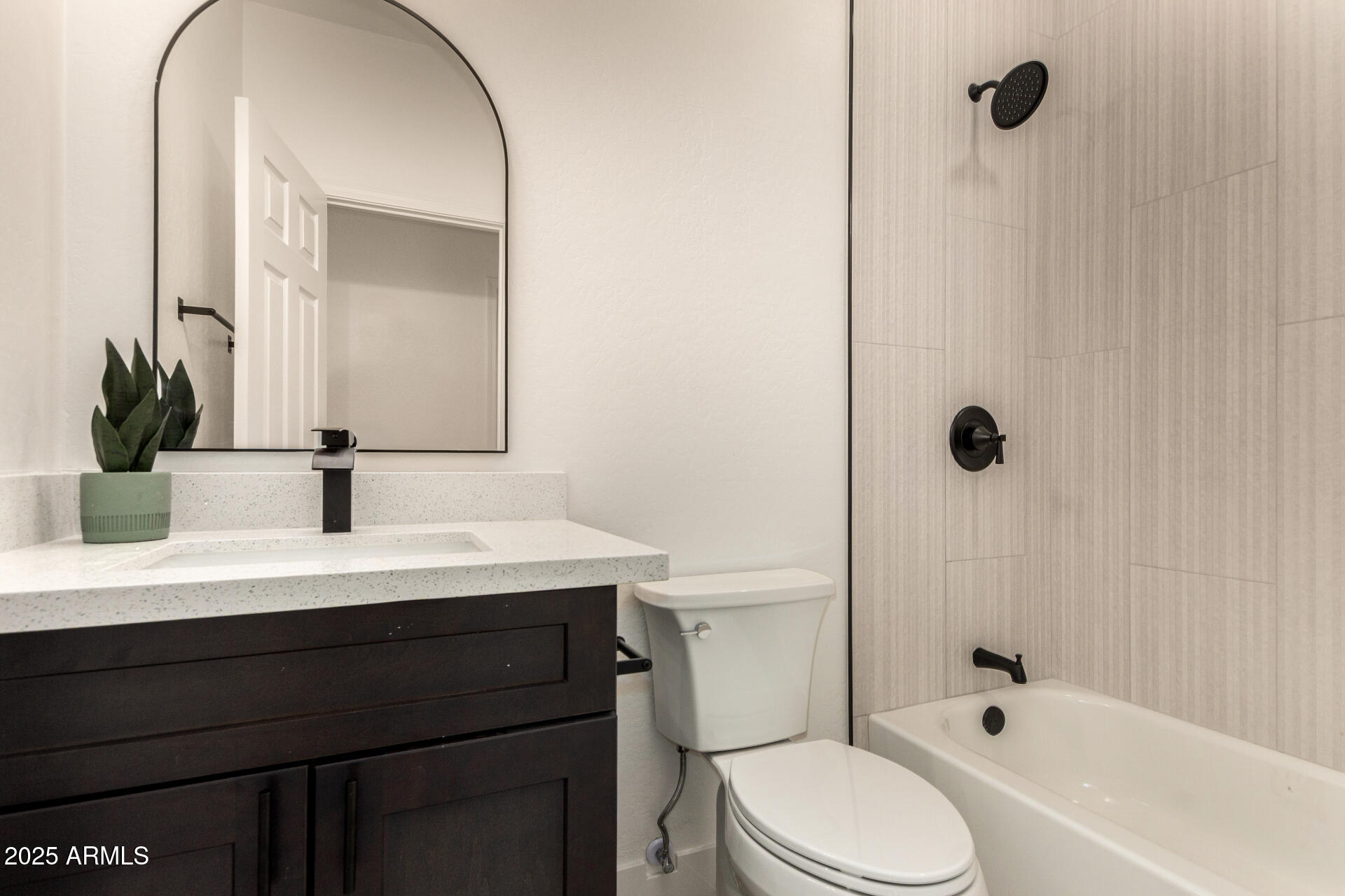 786 South Catalina Street Gilbert, AZ 85233 - Photo 27 of 34 a bathroom with a sink a toilet and shower