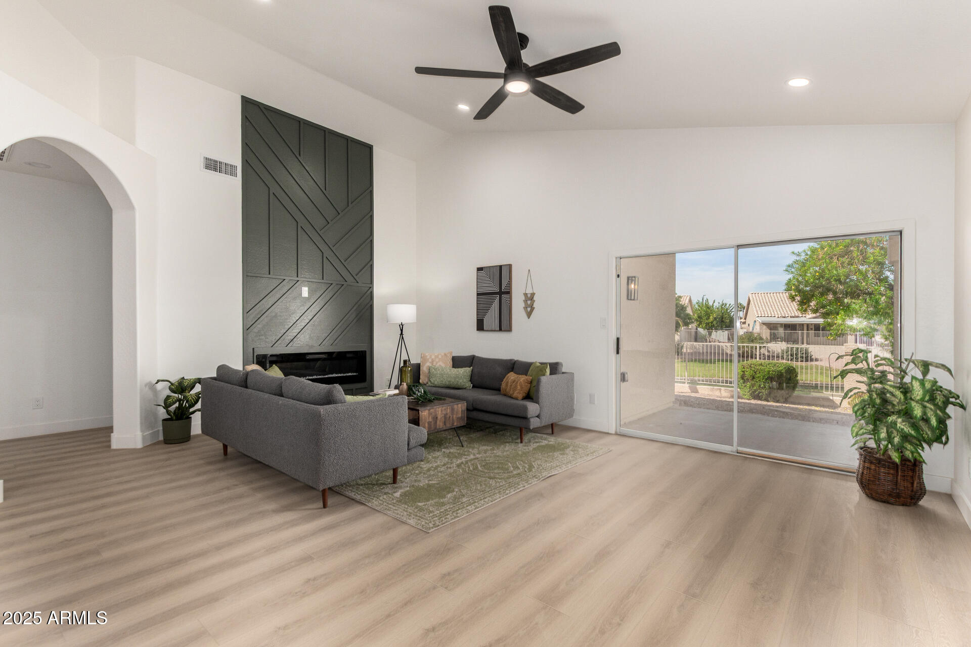 786 South Catalina Street Gilbert, AZ 85233 - Photo 9 of 34 a living room with furniture and a large window