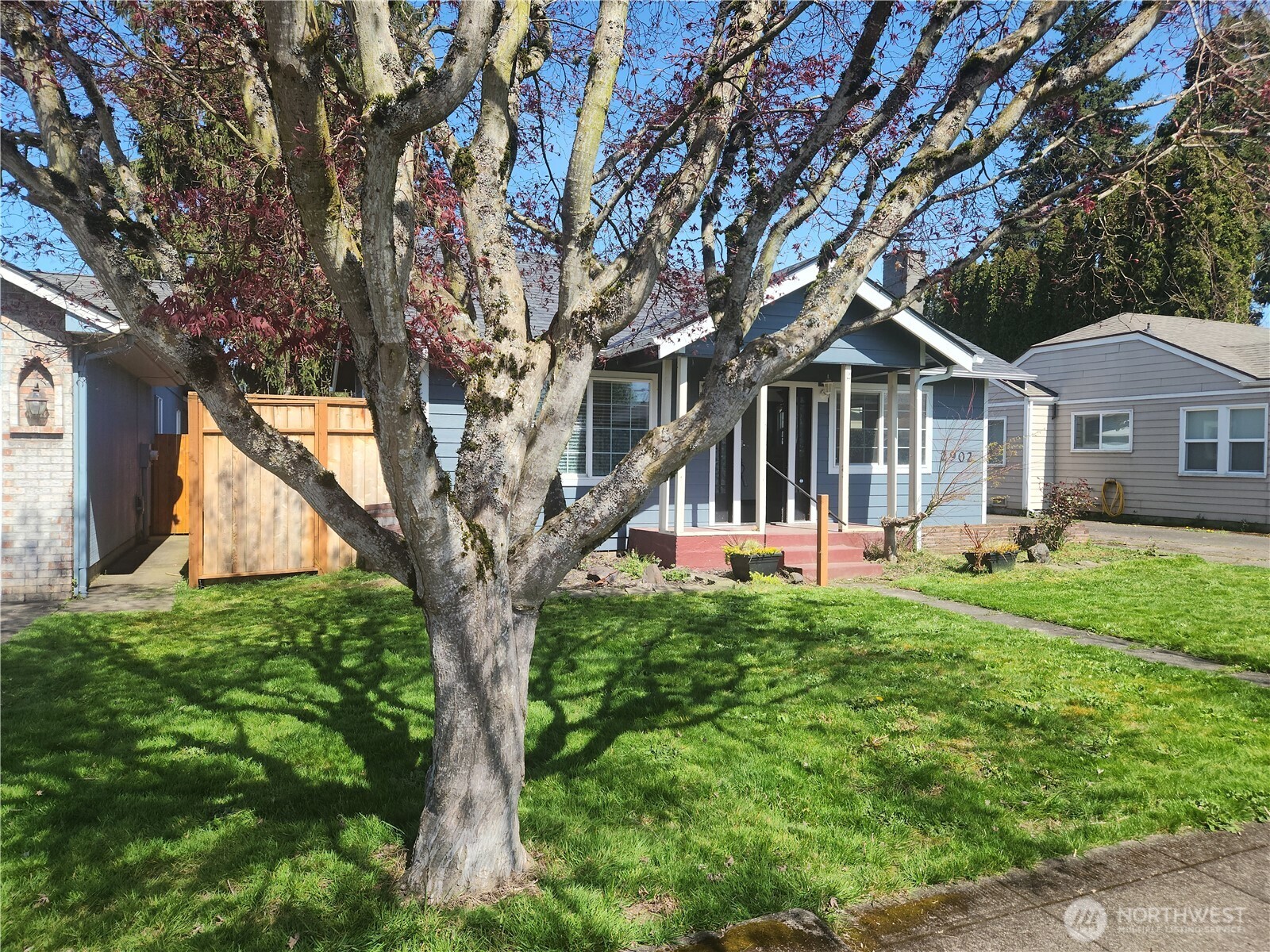 2902 Dover Street Longview, WA 98632 - Photo 2 of 23 a front view of a house with yard and green space
