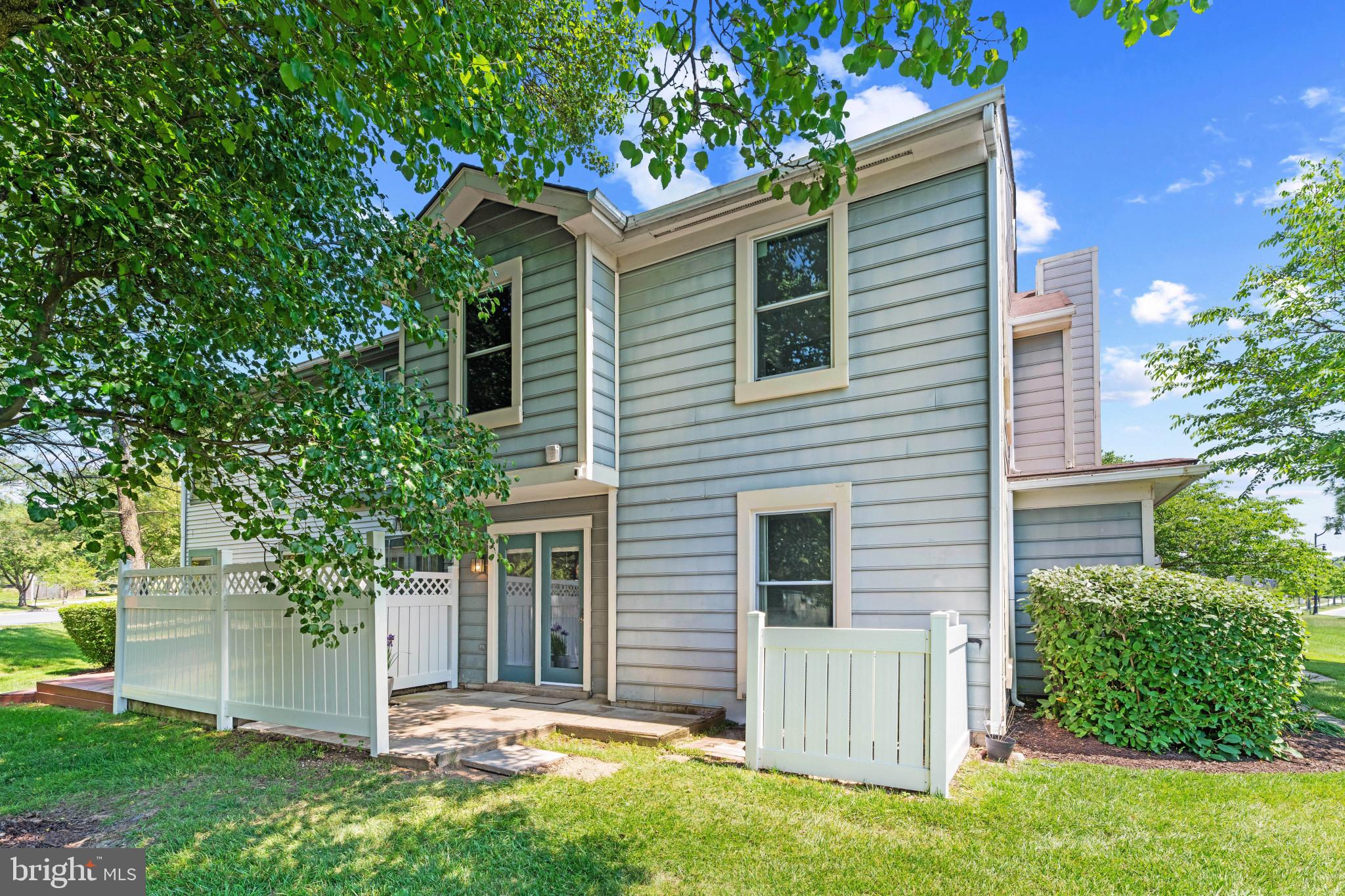 9302 Player Drive, Unit 155 Laurel, MD 20708 - Photo 41 of 43 front view of a house with a yard