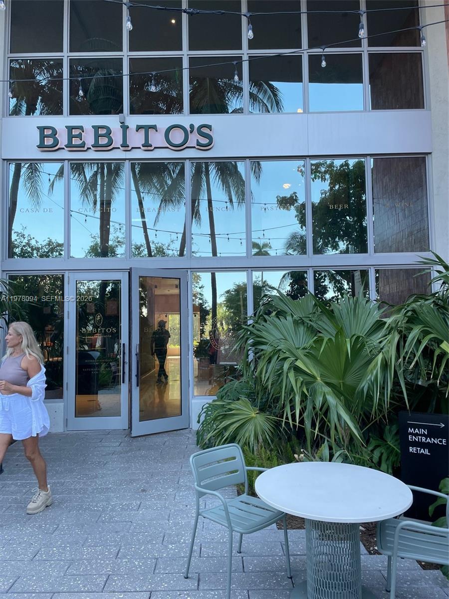 1500 Bay Road, Unit 524S Miami Beach, FL 33139 - Photo 24 of 27 a view of a chairs and table in a patio